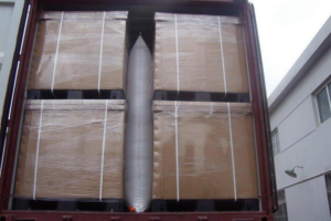 composite strapping used with dunnage airbag